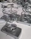 TUERCA CON RESORTE P/UNICANAL      